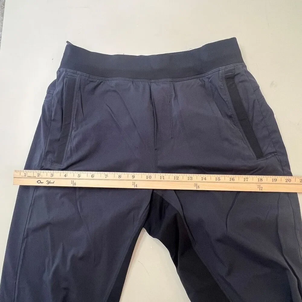 Lululemon Mens Stretch Drawstring License to Train Jogger Pants Black Gray Small